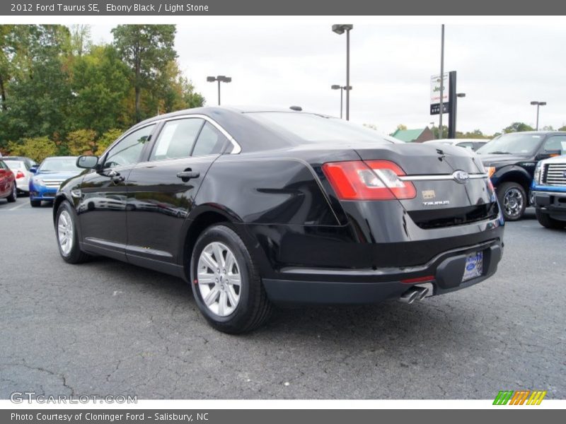 Ebony Black / Light Stone 2012 Ford Taurus SE