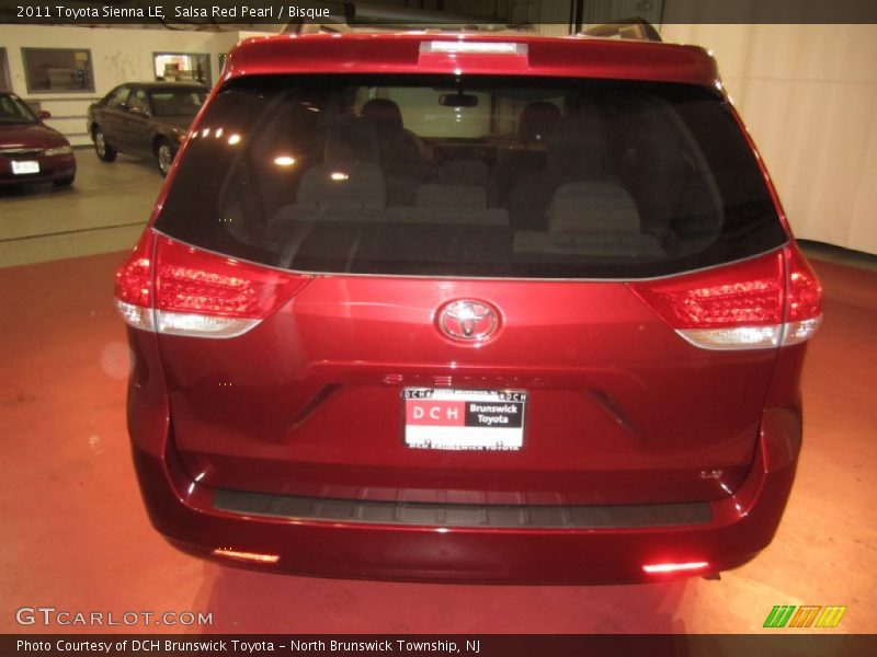 Salsa Red Pearl / Bisque 2011 Toyota Sienna LE