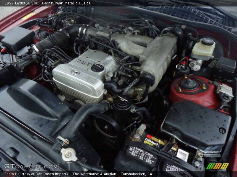 Garnet Pearl Metallic / Beige 1992 Lexus SC 300