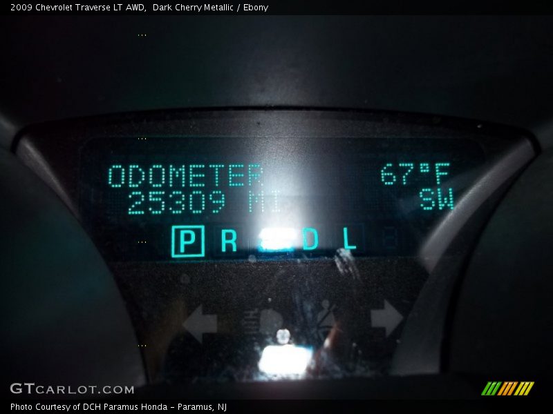 Dark Cherry Metallic / Ebony 2009 Chevrolet Traverse LT AWD