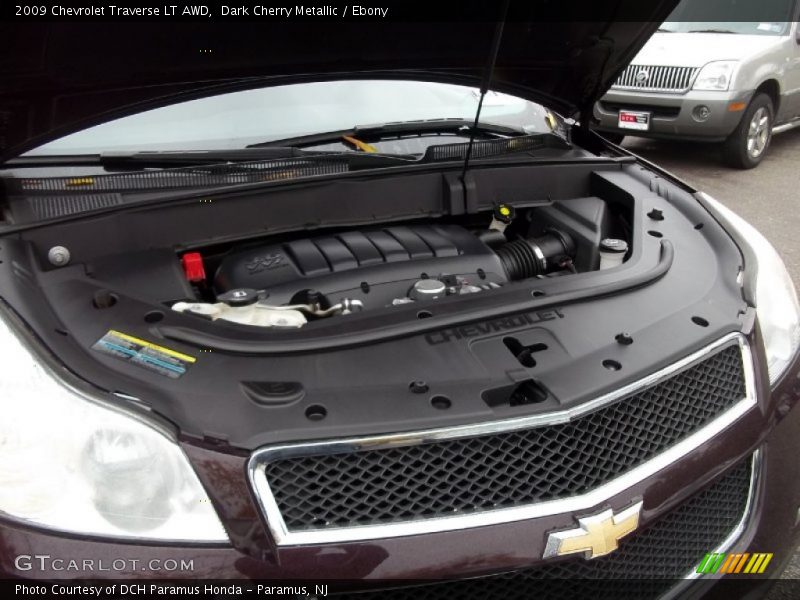 Dark Cherry Metallic / Ebony 2009 Chevrolet Traverse LT AWD