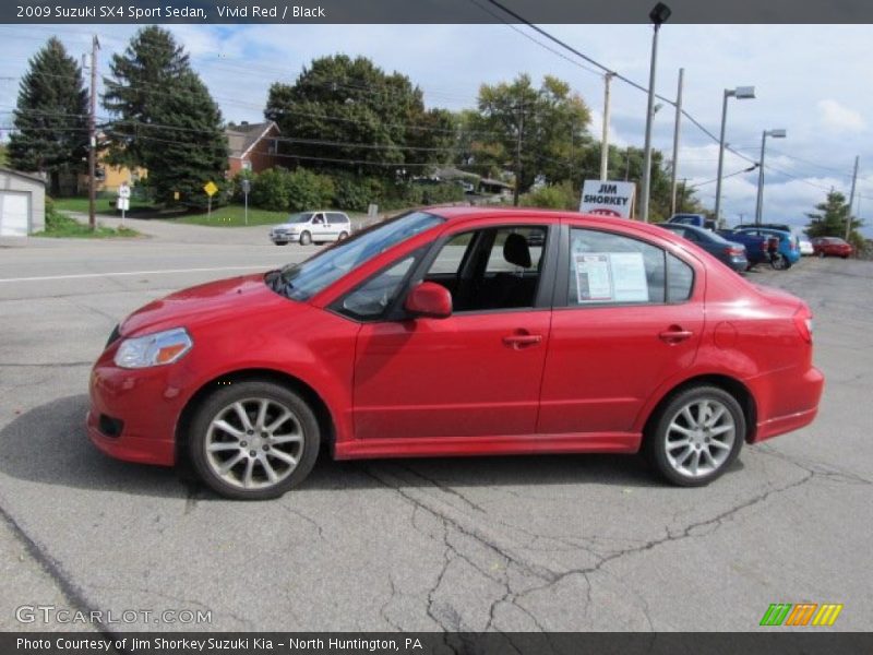  2009 SX4 Sport Sedan Vivid Red