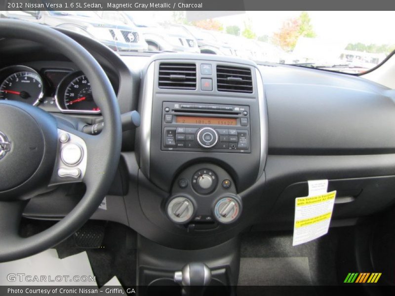 Magnetic Gray Metallic / Charcoal 2012 Nissan Versa 1.6 SL Sedan