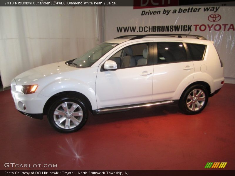 Diamond White Pearl / Beige 2010 Mitsubishi Outlander SE 4WD