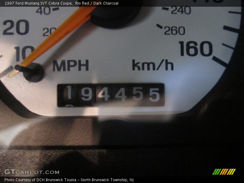 Rio Red / Dark Charcoal 1997 Ford Mustang SVT Cobra Coupe