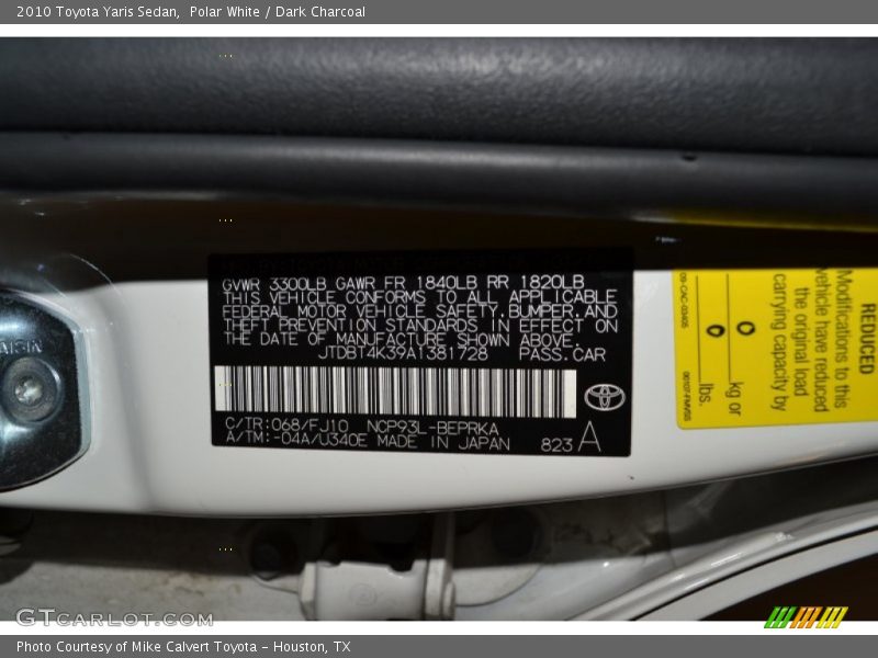 Polar White / Dark Charcoal 2010 Toyota Yaris Sedan