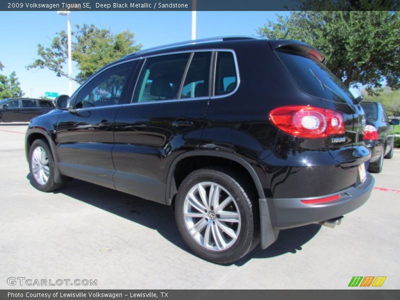 Deep Black Metallic / Sandstone 2009 Volkswagen Tiguan SE