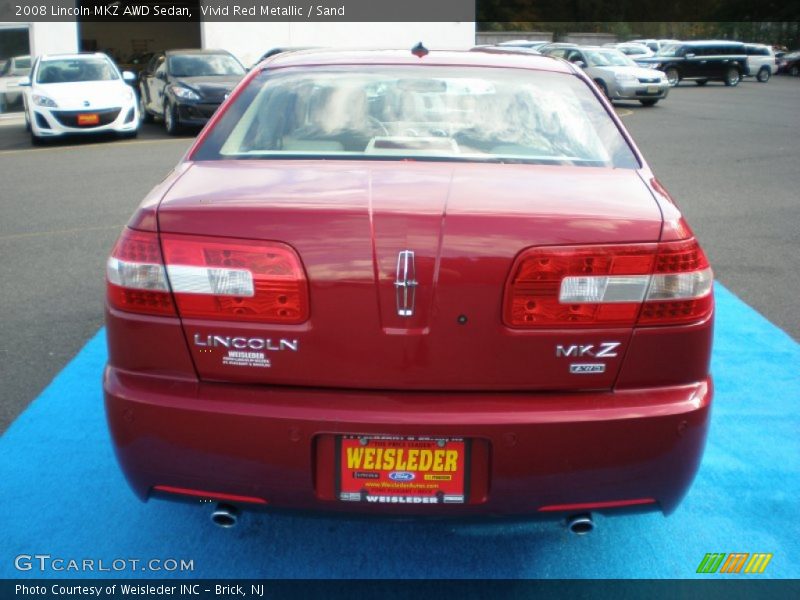 Vivid Red Metallic / Sand 2008 Lincoln MKZ AWD Sedan