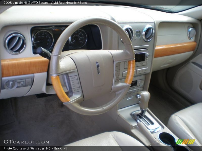 Vivid Red Metallic / Sand 2008 Lincoln MKZ AWD Sedan