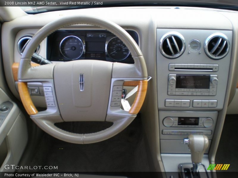 Vivid Red Metallic / Sand 2008 Lincoln MKZ AWD Sedan