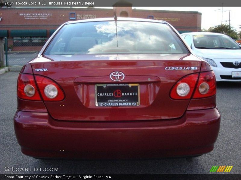 Impulse Red Pearl / Beige 2006 Toyota Corolla LE