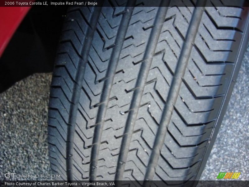 Impulse Red Pearl / Beige 2006 Toyota Corolla LE