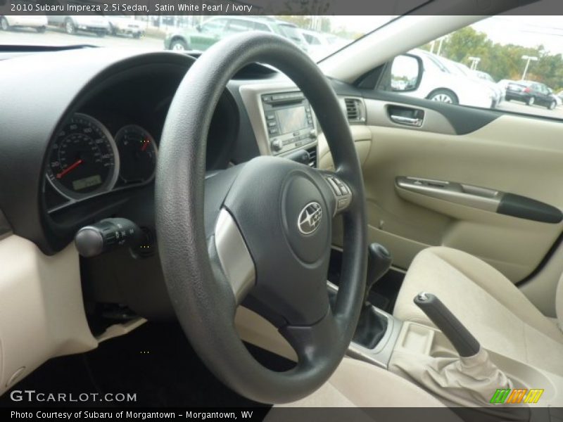 Satin White Pearl / Ivory 2010 Subaru Impreza 2.5i Sedan