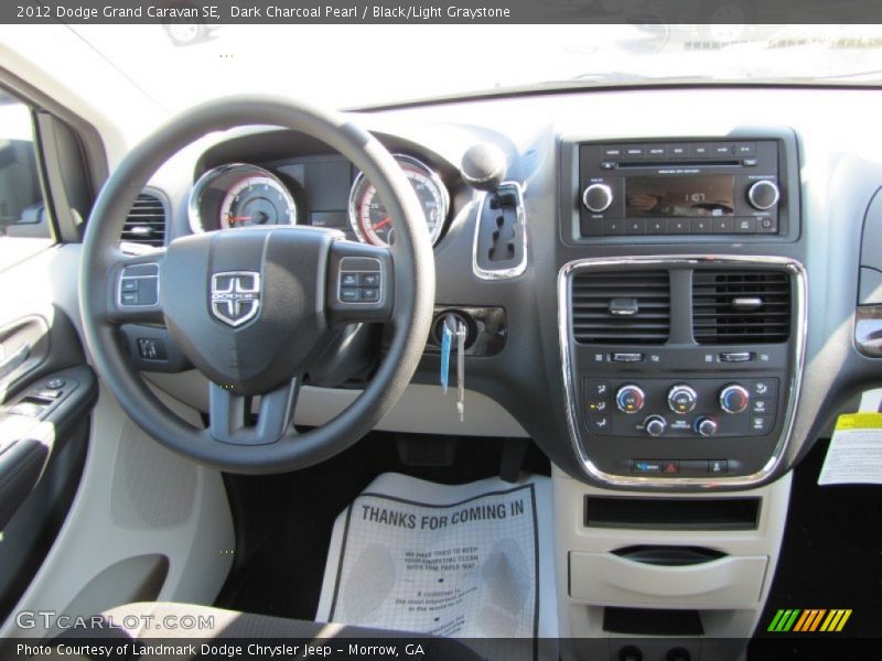 Dark Charcoal Pearl / Black/Light Graystone 2012 Dodge Grand Caravan SE