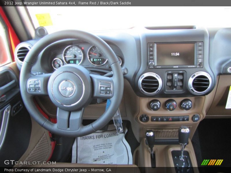 Flame Red / Black/Dark Saddle 2012 Jeep Wrangler Unlimited Sahara 4x4