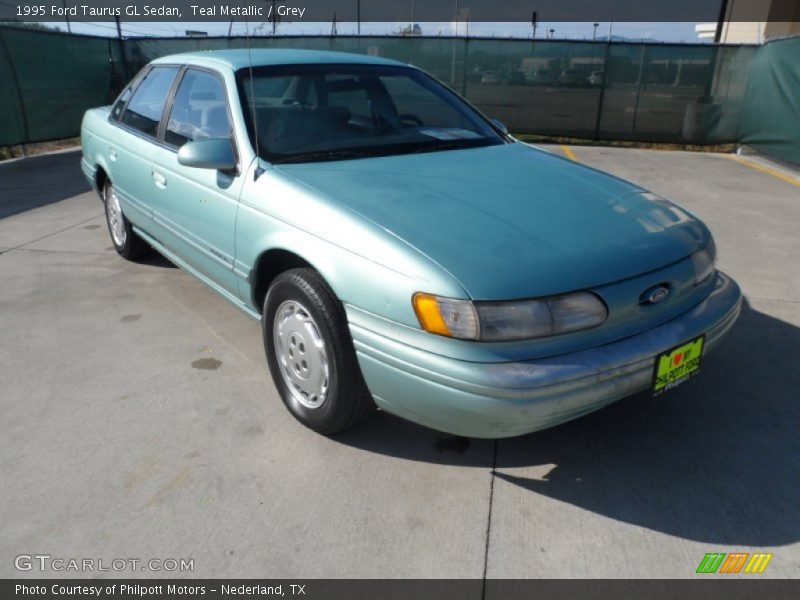 Teal Metallic / Grey 1995 Ford Taurus GL Sedan