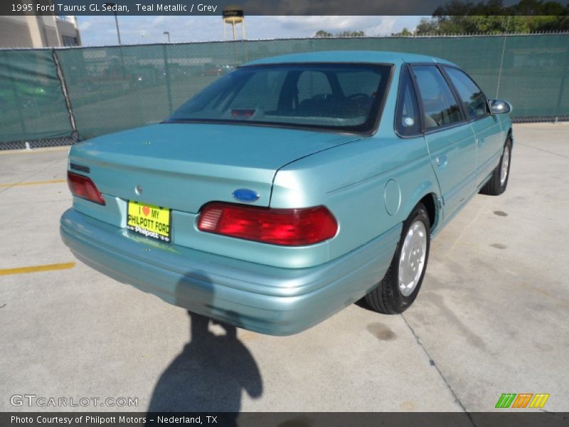 Teal Metallic / Grey 1995 Ford Taurus GL Sedan