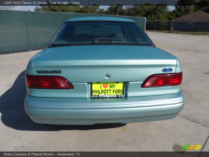 Teal Metallic / Grey 1995 Ford Taurus GL Sedan