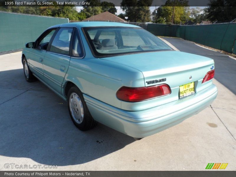 Teal Metallic / Grey 1995 Ford Taurus GL Sedan