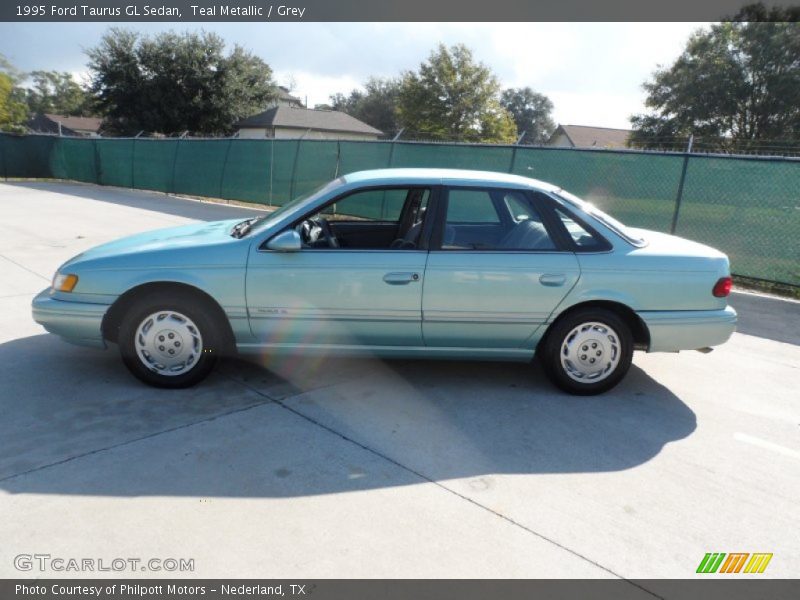 Teal Metallic / Grey 1995 Ford Taurus GL Sedan
