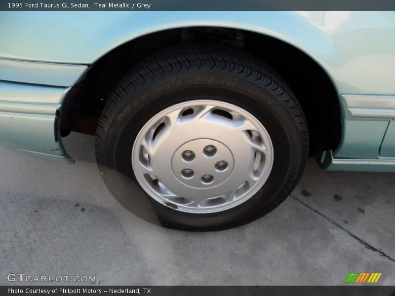 Teal Metallic / Grey 1995 Ford Taurus GL Sedan