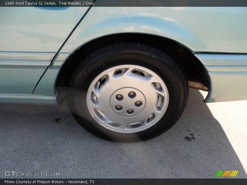 Teal Metallic / Grey 1995 Ford Taurus GL Sedan