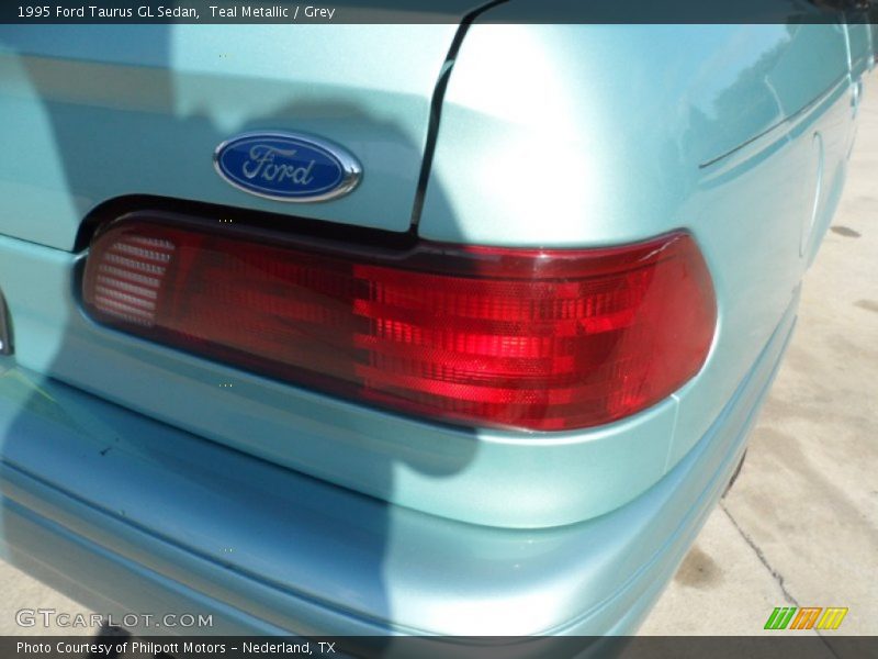 Teal Metallic / Grey 1995 Ford Taurus GL Sedan