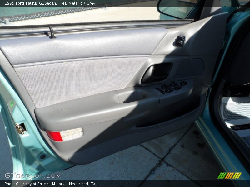 Teal Metallic / Grey 1995 Ford Taurus GL Sedan