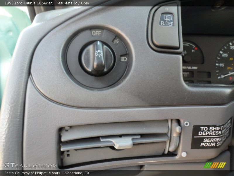 Teal Metallic / Grey 1995 Ford Taurus GL Sedan