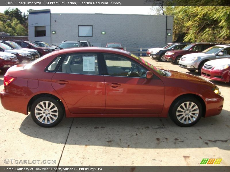 Paprika Red Pearl / Ivory 2009 Subaru Impreza 2.5i Premium Sedan