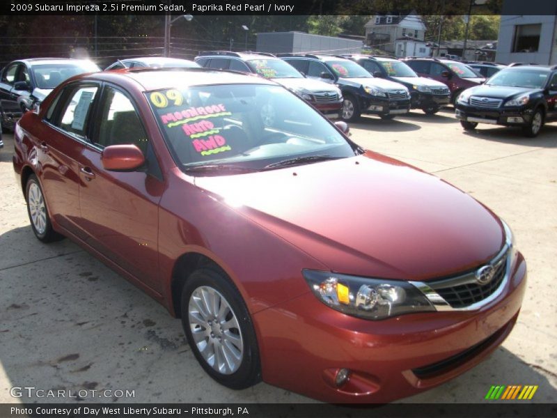 Paprika Red Pearl / Ivory 2009 Subaru Impreza 2.5i Premium Sedan