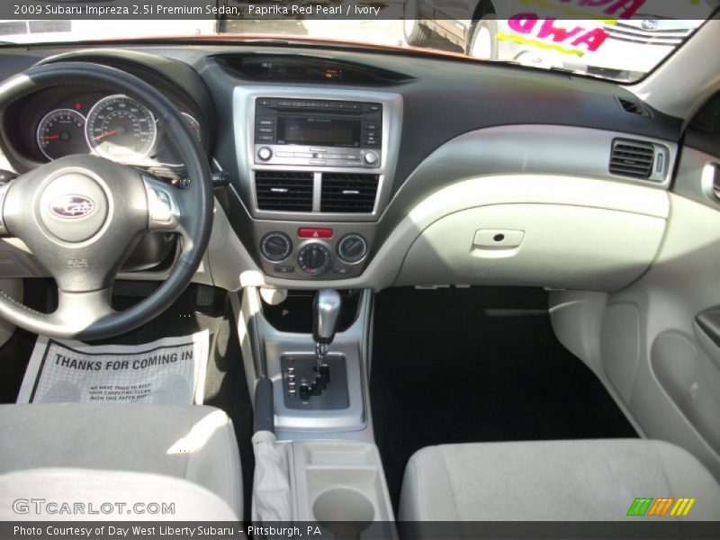Paprika Red Pearl / Ivory 2009 Subaru Impreza 2.5i Premium Sedan