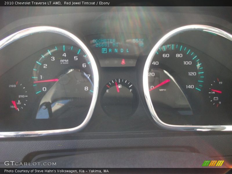 Red Jewel Tintcoat / Ebony 2010 Chevrolet Traverse LT AWD