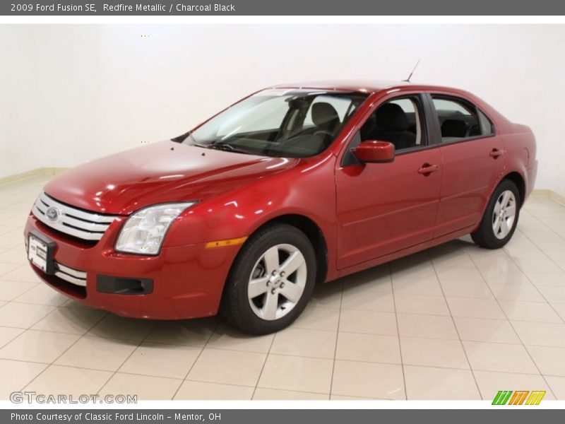 Redfire Metallic / Charcoal Black 2009 Ford Fusion SE