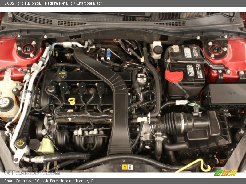 Redfire Metallic / Charcoal Black 2009 Ford Fusion SE