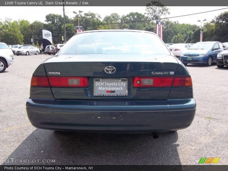 Dark Green Metallic / Oak 1998 Toyota Camry LE