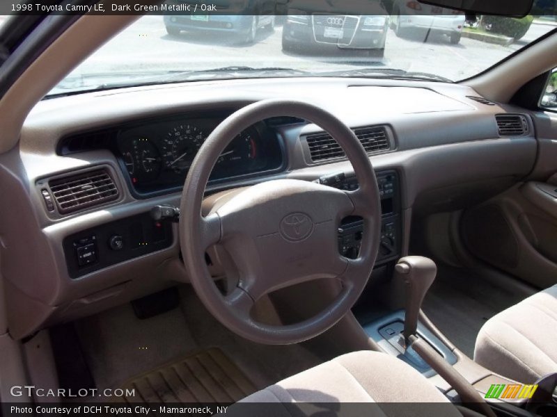 Dark Green Metallic / Oak 1998 Toyota Camry LE