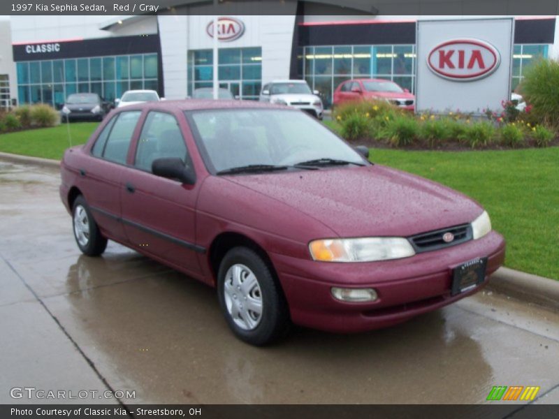 Red / Gray 1997 Kia Sephia Sedan