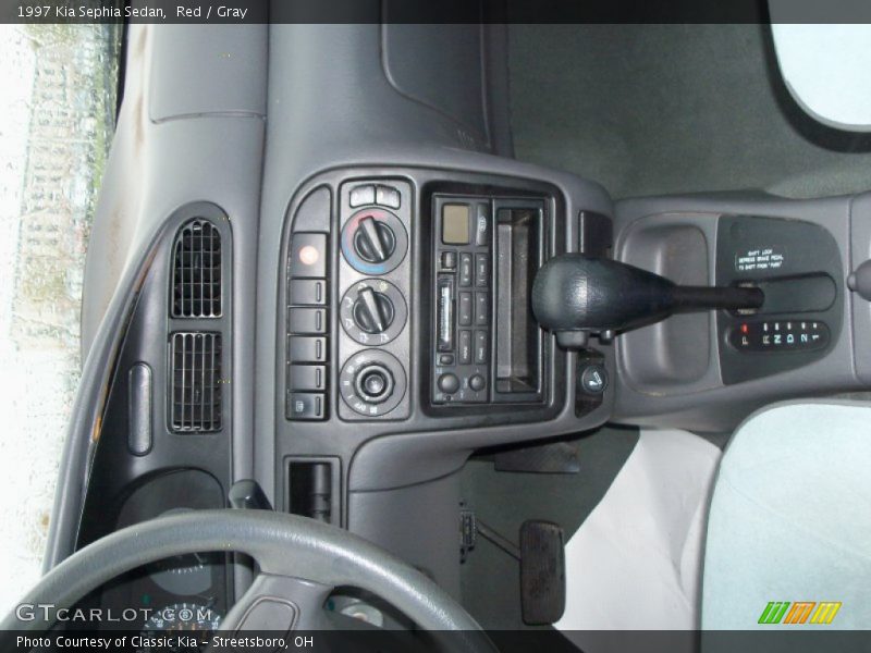 Red / Gray 1997 Kia Sephia Sedan