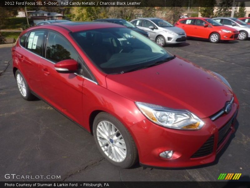 Red Candy Metallic / Charcoal Black Leather 2012 Ford Focus SEL 5-Door