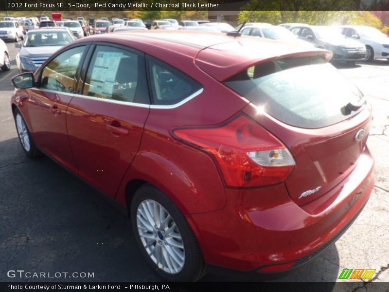 Red Candy Metallic / Charcoal Black Leather 2012 Ford Focus SEL 5-Door