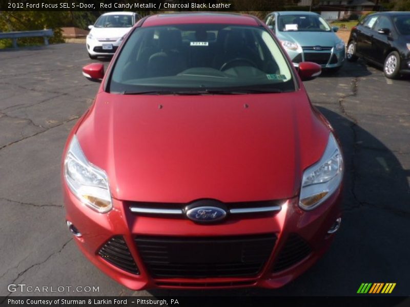Red Candy Metallic / Charcoal Black Leather 2012 Ford Focus SEL 5-Door