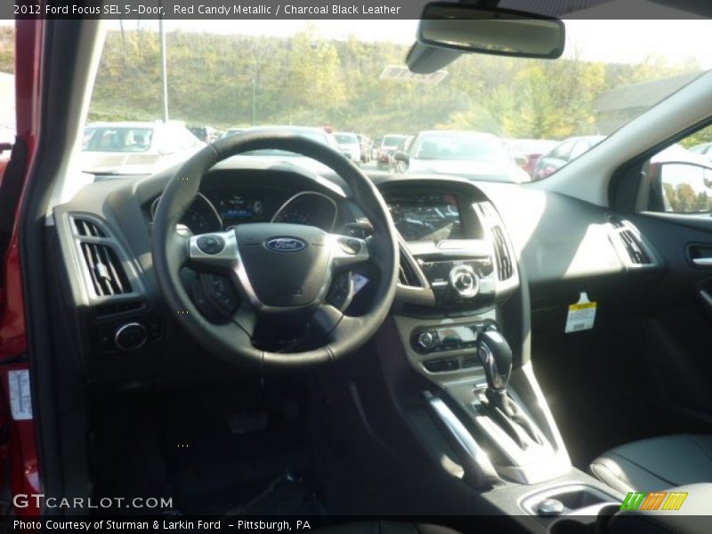 Red Candy Metallic / Charcoal Black Leather 2012 Ford Focus SEL 5-Door