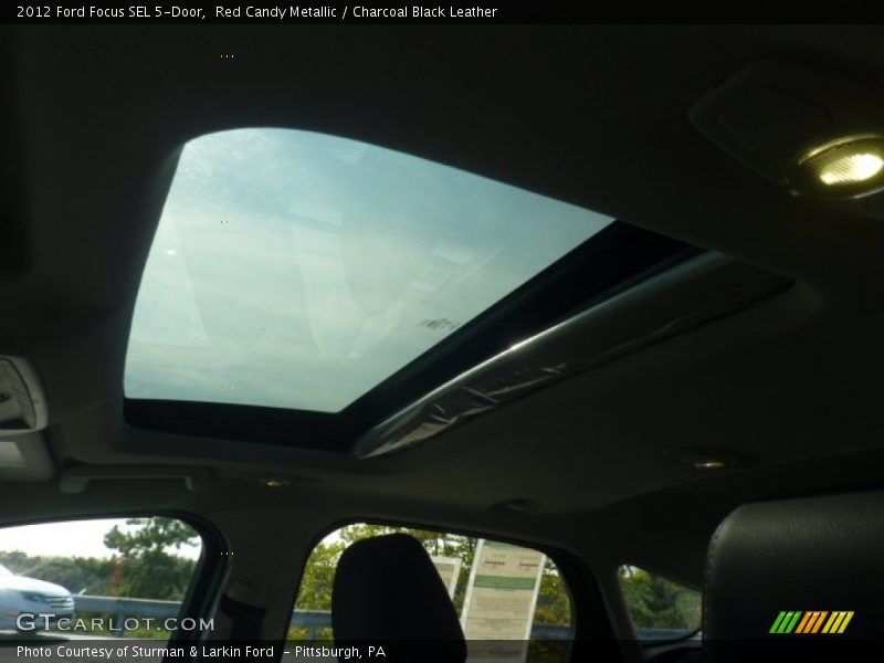 Red Candy Metallic / Charcoal Black Leather 2012 Ford Focus SEL 5-Door