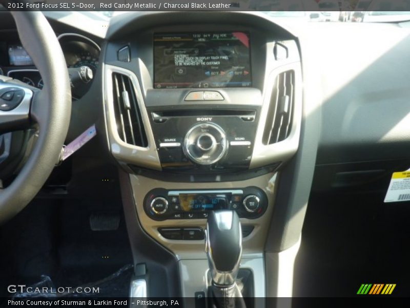 Red Candy Metallic / Charcoal Black Leather 2012 Ford Focus SEL 5-Door