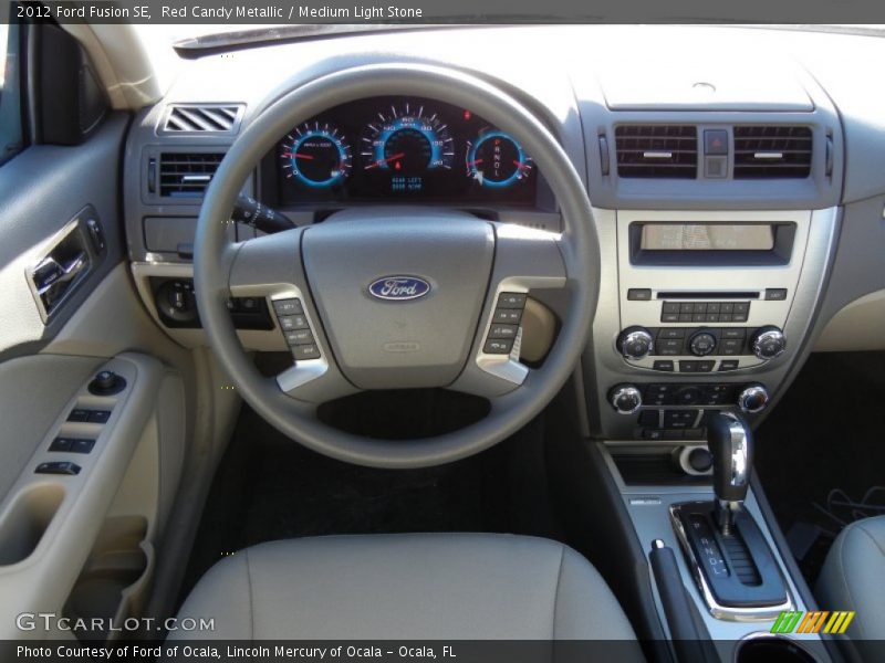 Red Candy Metallic / Medium Light Stone 2012 Ford Fusion SE