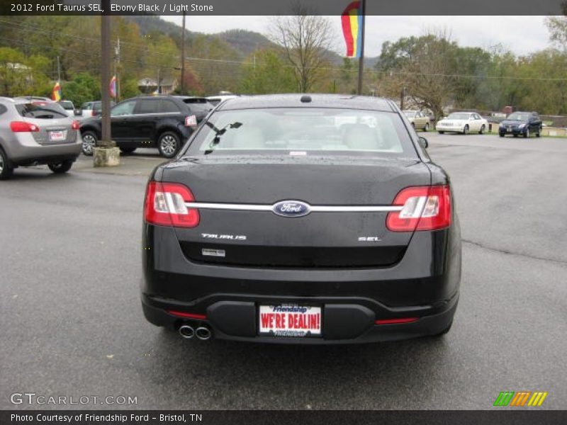 Ebony Black / Light Stone 2012 Ford Taurus SEL