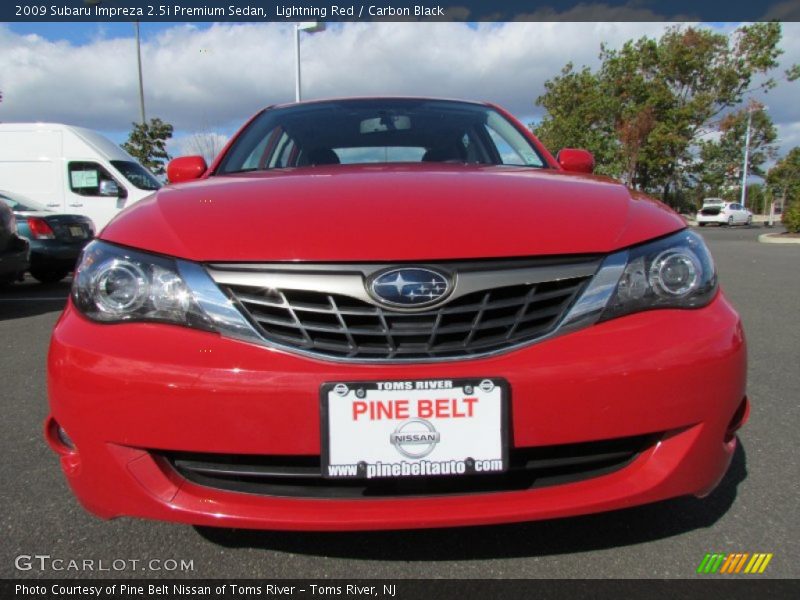 Lightning Red / Carbon Black 2009 Subaru Impreza 2.5i Premium Sedan