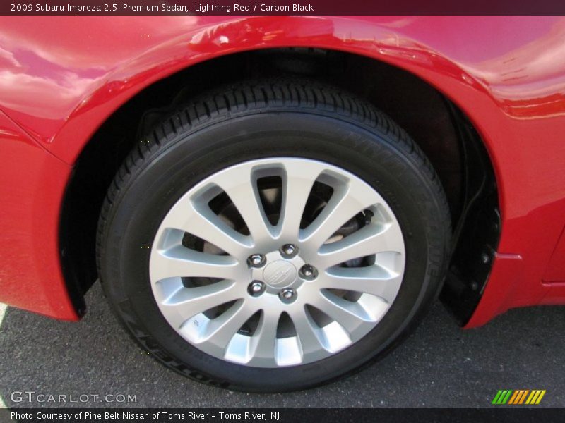 Lightning Red / Carbon Black 2009 Subaru Impreza 2.5i Premium Sedan