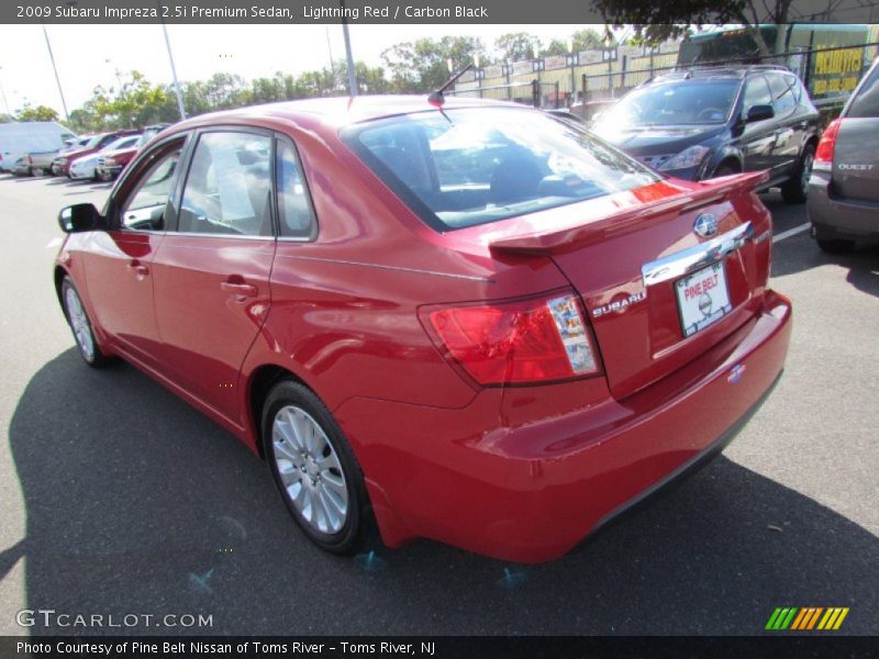 Lightning Red / Carbon Black 2009 Subaru Impreza 2.5i Premium Sedan
